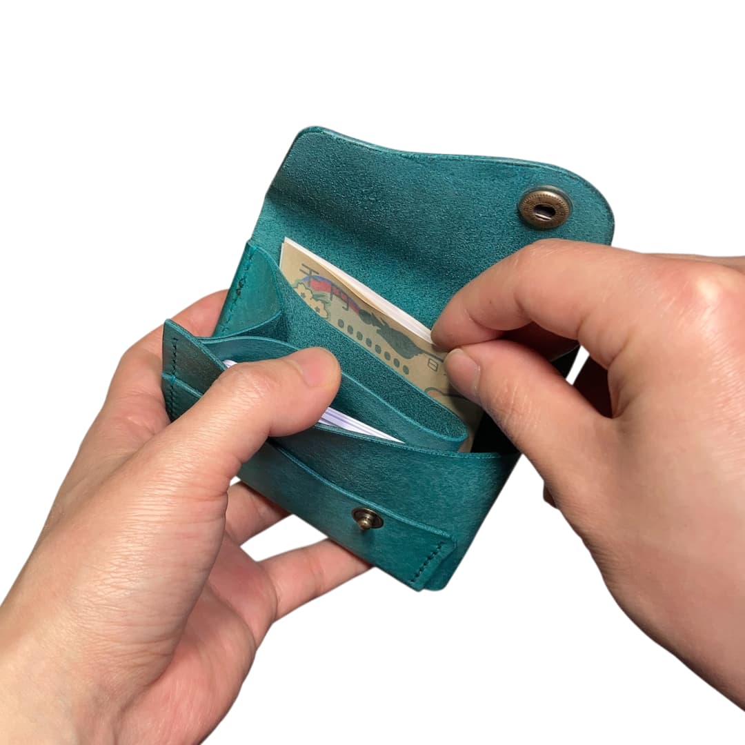クロスフラップミニウォレット マヤ ターコイズブルー お札ポケット